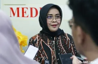 Hakim Konstitusi yang juga Juru Bi