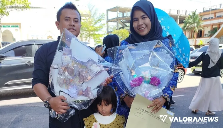 Rifki (41), suami dari salah seorang guru penerima SK PPPK di SMA 1 Batipuah. (humas)