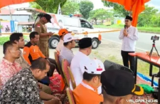 Ketua DPW PKS Sumbar, Ulyadi memberikan arahan pada pembukaan Posko Mudik DPD PKS Padang di Jl Bypass dekat Gerbang Tol Anak Air, Kampus UISB, Padang. (humas)