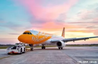 Maskapai Scot Airline.