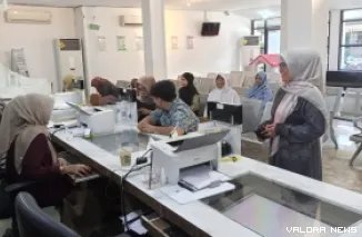 Petugas Disdukcapil Kota Padang Tetap Melayani Kebutuhan Adminduk Warga, Saat Libur dan Cuti Bersama (*)