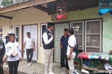 Calon Wali Kota Bukittinggi, berbincang didepan pintu rumah warga di Cimpago Guguak Bulek, EKM