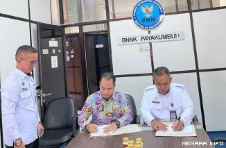 Nanang Rukmana bersama Kepala Badan Narkotika Nasional Kota (BNNK) Payakumbuh M. Febrian Jufril, S.E., M.Si. resmi menandatangani Nota Kesepahaman (MoU)