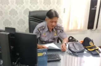 Humas Imigrasi Kelas I Non TPI Agam, Putu Agus Sugiarto saat memberikan keterangan kepada awak media