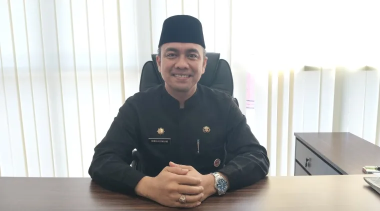 Kepala Dinas Perpustakaan dan Arsip Kota Padang, Heriza Syafani (VR)