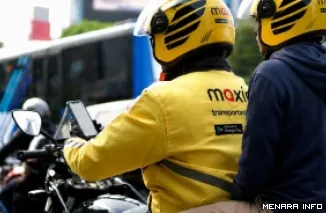 Layanan antar maxim dengan kendaraan roda dua.