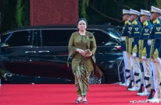 Ketua DPR RI, Puan Maharani memakai kebaya brokat yang terinspirasi dari kebaya Sunda berwarna hijau olive dengan detail ribbon applique pada Sidang Tahunan MPR dan Sidang Bersama DPR-DPD 2026 di Gedung Nusantara, Senayan, Jakarta, Jumat. (humas)