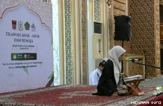 Penampilan Salah Seorang Peserta Cabang Tilawah Pada MTQ Nasional Tingkat Kota Padang (*)