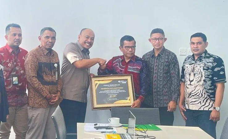 Kepedulian Terhadap Tenaga Kerja Rentan Pemko Terima Penghargaan Melalui BPJS Ketenagakerjaan