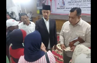 1.419 Orang Warga Guguak Panjang Terima Bantuan Sosial Program Sembako dan PKH