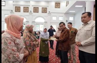 Pemko Bukittinggi Salurkan Bantuan PKH Tahap 3 Triwulan II
