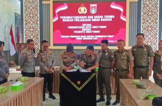 Penandatanganan dan Serah Terima NPHD Pengamanan Pilkada 2024