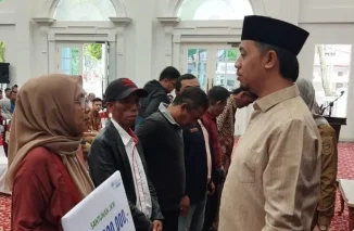 Erman Safar: Ini Adalah Bentuk Perhatian Kami Bagi Ketua RT/RW, LPM dan Kader Posyandu Sebagai Perpanjangan Tangan dari Pemko