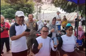 Peringati World Walking Day Tahun 2024 Disdukcapil Bukittinggi Buka Stan Ayo Beralih ke IKD
