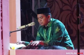 Terlihat kafilah dari Kota Padang Panjang tampil di panggung utama dalam lombo MTQ Nasional ke 41 tingkat Provinsi Sumatera Barat di Kota Bukittinggi. Foto Istimewa.